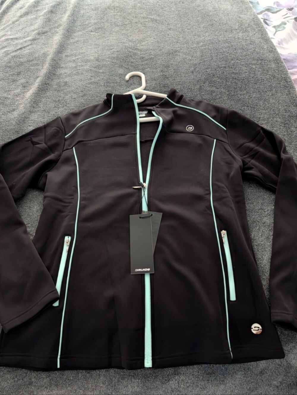 Sporty Golf Black Jacket with Mint Trim.